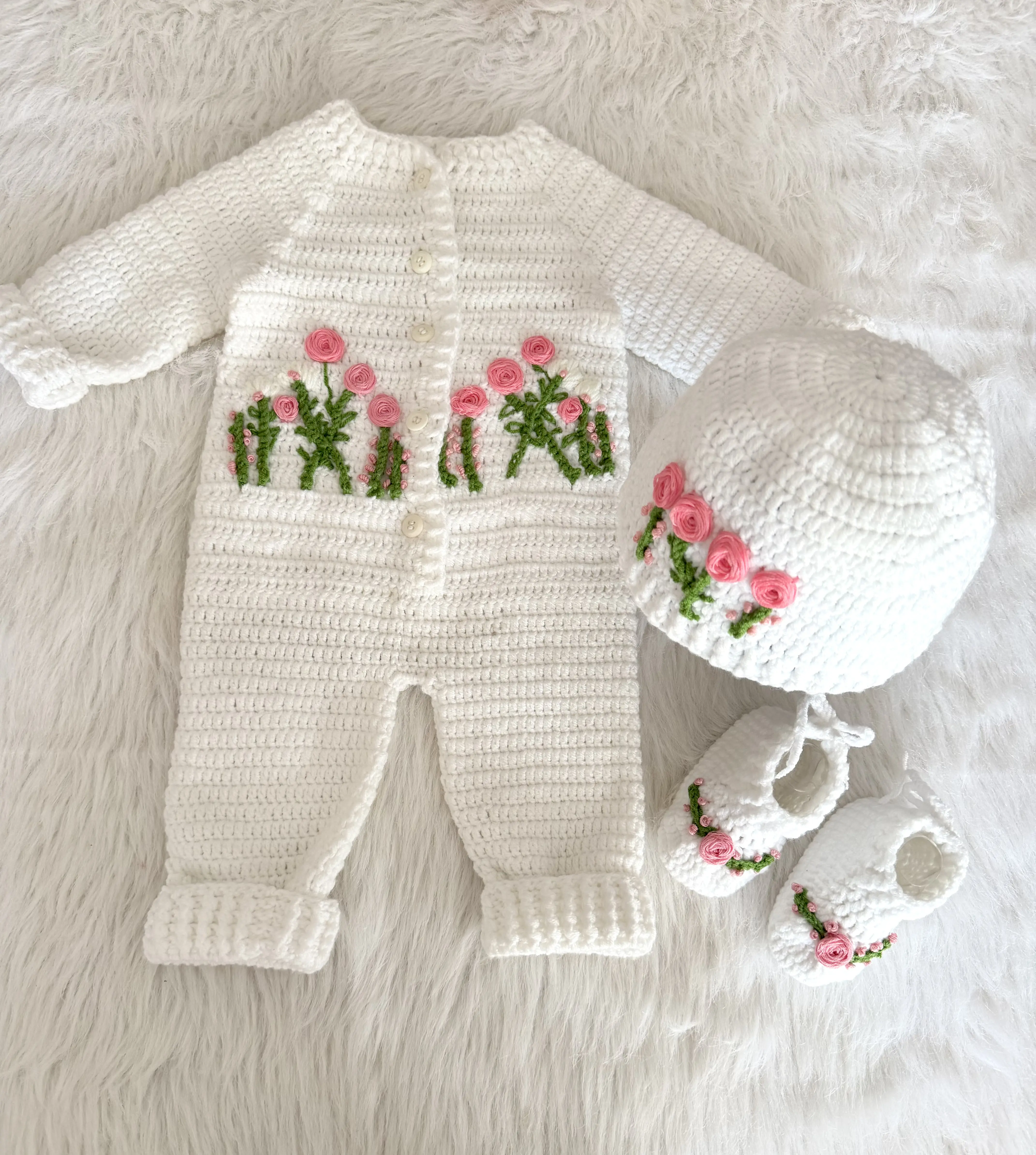 Baby crochet romper with floral embroidery
